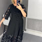 Rozkloszowana sukienka Plus Size w kropki
